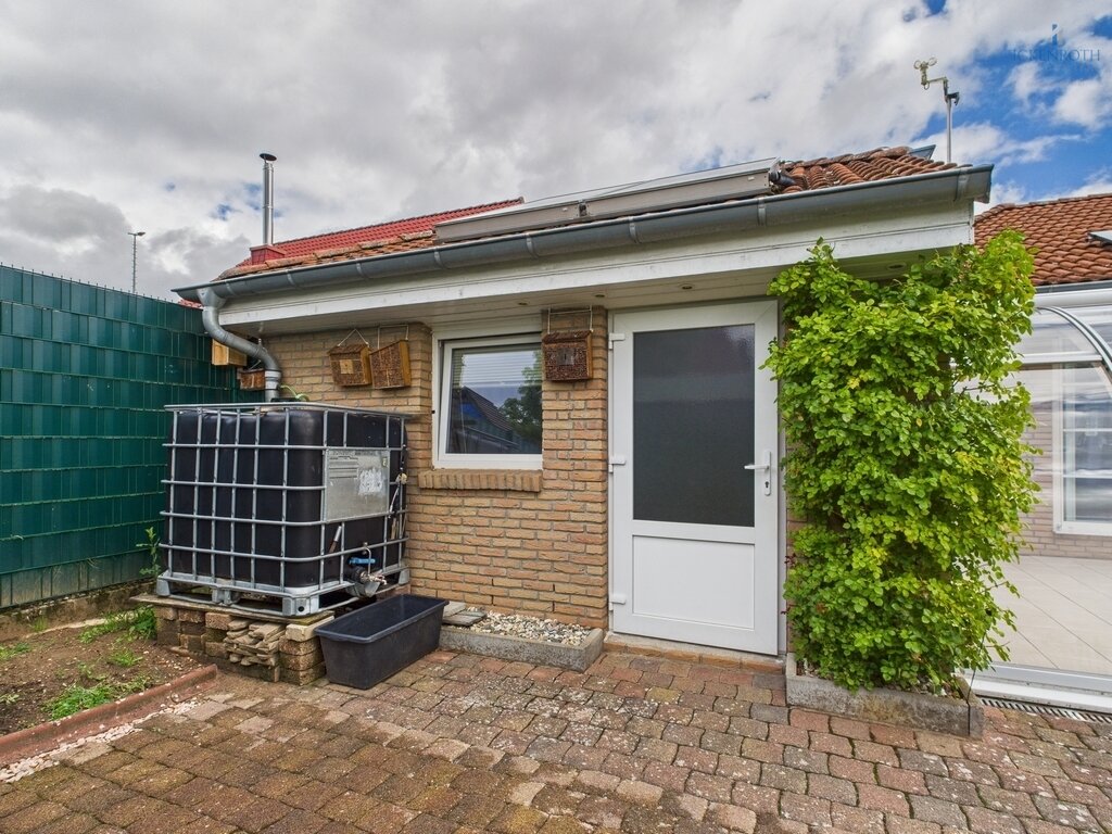 **Traumhafter Bungalow mit idyllischem Garten, XXL Garage, Wintergarten, barrierefrei!**